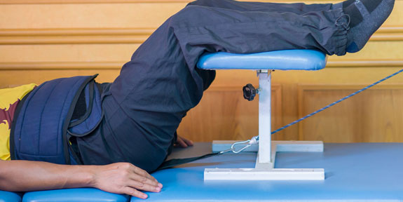 patient getting Traction Therapy for auto accident injury in Plano